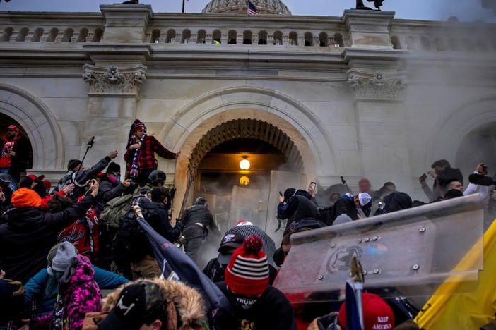 Trump supporters clash with police and security forces as people try to storm the U.S. Capitol on Jan. 6.