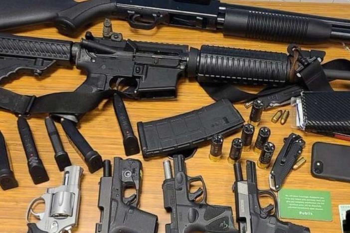 The weapons the suspect was armed with at the time of his arrest at an Atlanta grocery store Wednesday.