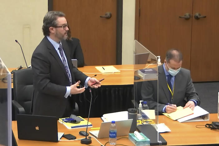Defense attorney Eric Nelson (left) with his client, former Minneapolis police officer Derek Chauvin, on Monday. Chauvin is on trial for murder in the death of George Floyd in police custody in May 2020.