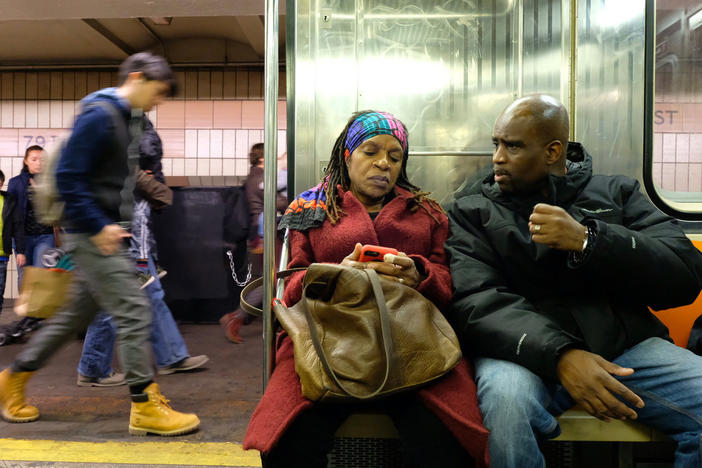 Sheila Rule and Joe Robinson take the subway to a Riverside Church Prison Ministry meeting in Manhattan on Nov. 20, 2016. Rule and Robinson, married for almost 12 years while Joe was still incarcerated, are here together for the first time since he was released from a 25-year prison sentence for killing a man.