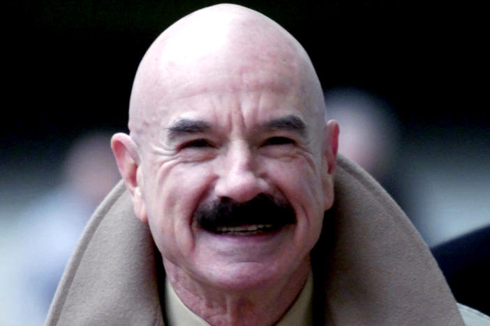 G. Gordon Liddy, pictured in 2001, died on Tuesday at the age of 90. He was convicted for orchestrating the Watergate burglary and wiretapping scheme that led to President Nixon's disgraced resignation.