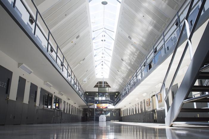 Within the Federal Bureau of Prisons, inmates are asked to "voluntarily" agree to electronic monitoring in order to use the bureau's email system. Above, a prison cell block is seen at the Federal Correctional Institution, El Reno in Oklahoma in 2015.