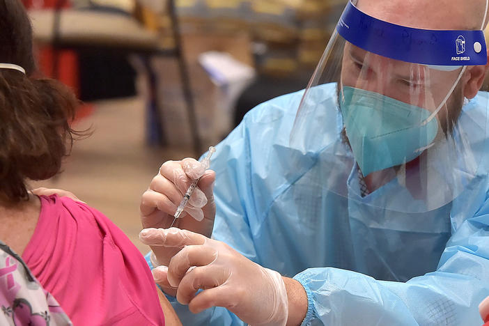 A federal program administered nearly 8 million COVID vaccine doses in nursing homes, reaching the majority of residents. But many staff members chose not to get the shot.