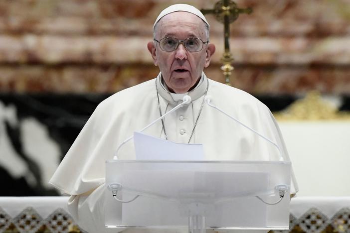 Pope Francis speaks prior to delivering his Urbi et Orbi blessing after celebrating Easter Mass on Sunday at St. Peter's Basilica in the Vatican.