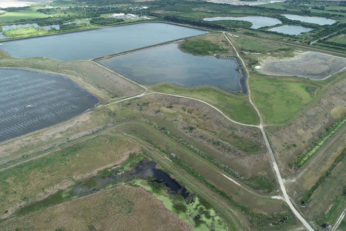A leak at the reservoir at Piney Point, an old phosphate plant in Manatee County, Fla., as shown in an aerial photo on Saturday, has prompted evacuations, environmental concerns and threats of a full-fledged breach.