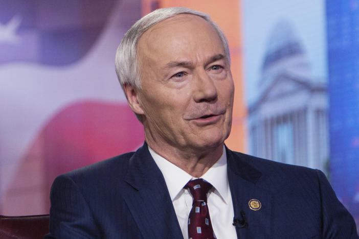 Arkansas Gov. Asa Hutchinson, pictured in 2019, on Monday said the bill banning gender-affirming medical care for transgender youth would set "new standards of legislative interference with physicians and parents as they deal with some of the most complex and sensitive matters involving young people."