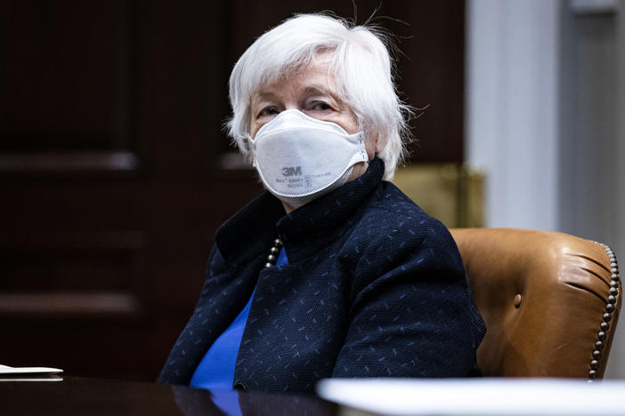 Treasury Secretary Janet Yellen listens during a meeting with President Biden in the White House on March 5. Yellen on Monday proposed a minimum global tax rate for corporations.