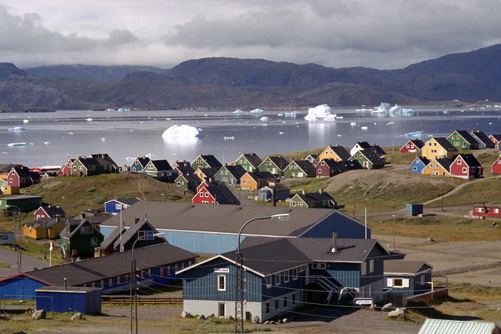 Giant icebergs float in the fjord in the southern Greenland town of Narsaq, the site of a controversial Australian-led uranium and rare-earth mining project. The open-pit mine has divided opinion on the island, which goes to the polls on Tuesday.