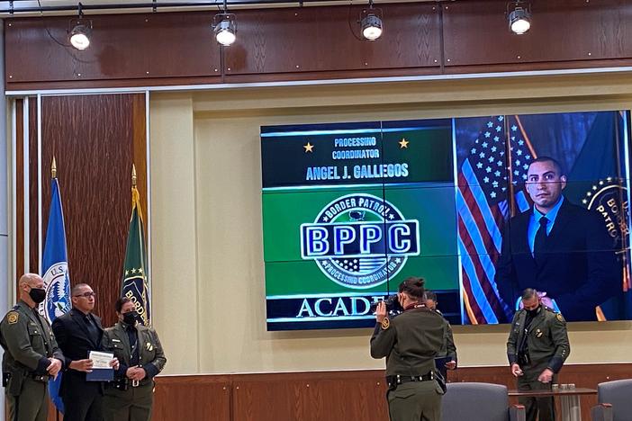 The recent graduation ceremony for the Border Patrol's processing coordinator program. The people in these new positions will be assigned to work inside stations to care for individuals whom Border Patrol agents apprehend.