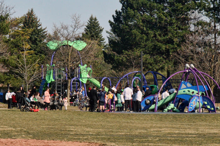 A crowd of parents and children at a playground during the COVID-19 pandemic in Toronto on April 4. Canada is experiencing a third wave of the coronavirus pandemic.