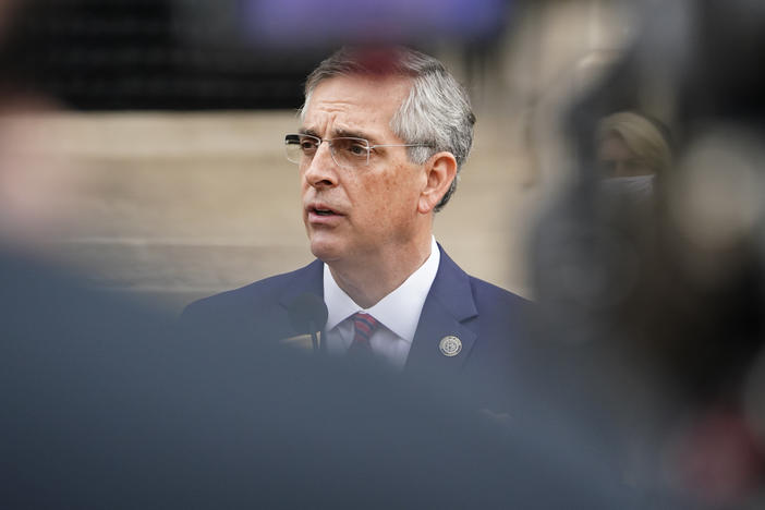 Georgia Secretary of State Brad Raffensperger won wide praise for firmly rejecting former President Donald Trump's false claims of voter fraud. But now that those claims have spawned tighter voting measures, the Republican state official is taking a softer approach.