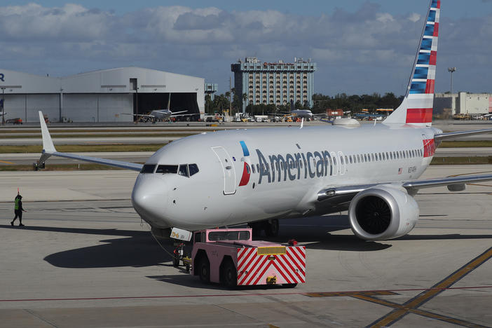 Boeing said Friday that some of its 737 Max planes may have an electrical problem, leading airlines to ground dozens of the jets. An American Airlines flight on a Boeing 737 Max is seen here in December in Miami.