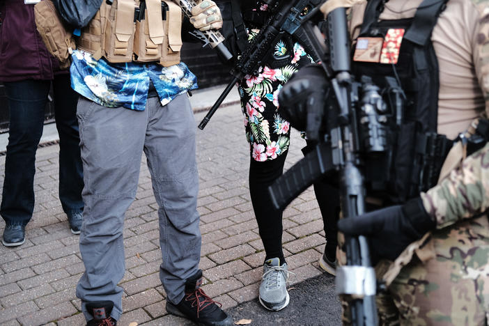 Four alleged members of the "boogaloo boys," an extremist group often identified by their militia gear and hawaiian print, have been indicted for destroying evidence tied to two Bay area police killings.