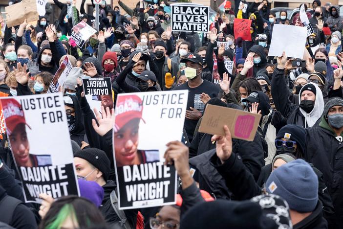 Hundreds gathered before the 7 p.m. curfew outside the Brooklyn Center police station to mourn and protest the death of 20-year-old Black man Daunte Wright.
