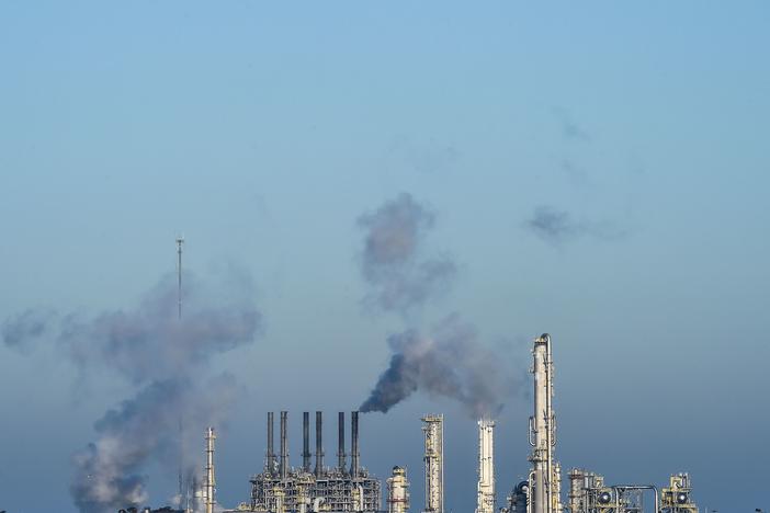 An oil and gas processing plant  in Lake Charles, La. in October 2020. The Biden administration is expected to announce aggressive new targets for reducing greenhouse gas emissions.