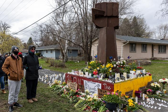 Mourners have built a makeshift memorial for Daunte Wright on the streets of Brooklyn Center, Minn., the quiet inner-ring suburb where police shot and killed Wright on April 11.