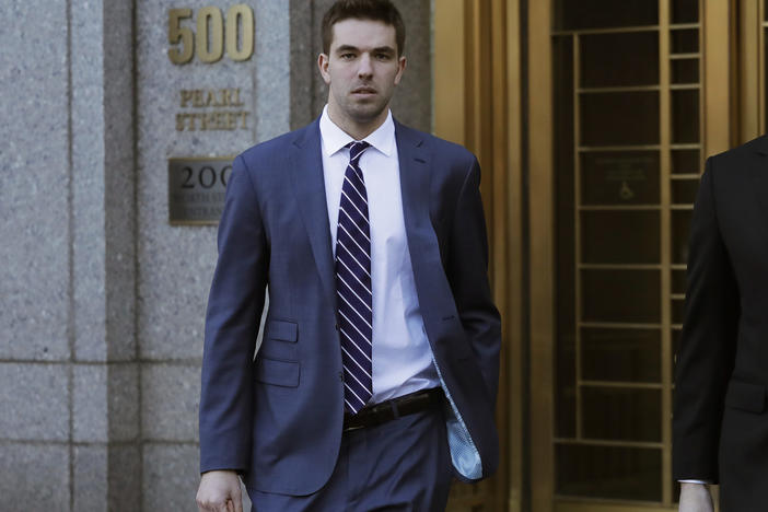 Billy McFarland, pictured leaving federal court in March 2018, was sentenced to six years in prison after pleading guilty to fraud charges related to the failed Fyre Festival. Ticket holders and event organizers reached a settlement in a class-action suit this week.