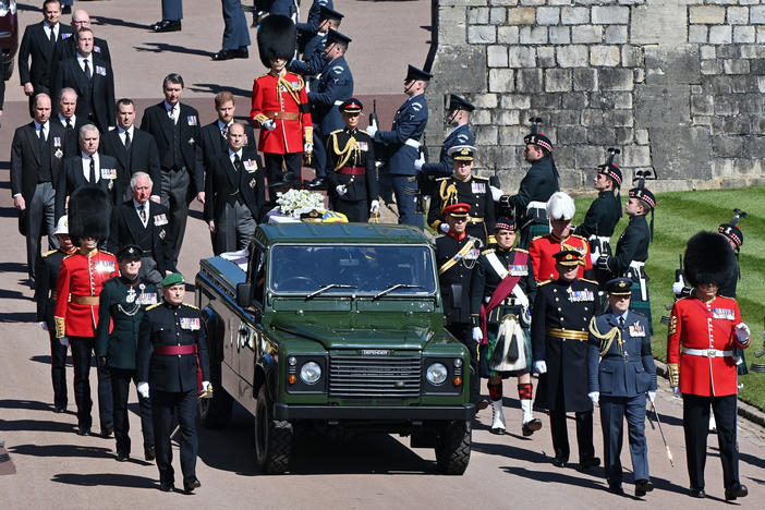 Members of the royal family follow Prince Philip's coffin during the ceremonial procession during his funeral at Windsor Castle on Saturday in Windsor, England.
