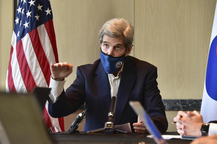 U.S. special envoy for climate John Kerry speaks during a roundtable meeting with reporters in Seoul on Sunday. The United States and China have agreed to cooperate with other countries to curb climate change, just days before a virtual summit of world leaders to discuss the issue.