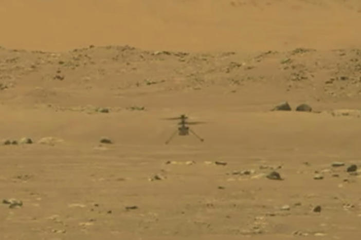 NASA's 4-pound, experimental helicopter Ingenuity lands on the surface of Mars on Monday.