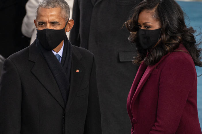 Former President Barack Obama and former first lady Michelle Obama arrive at President Biden's inauguration.