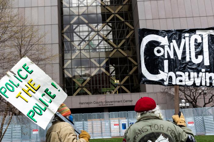 People gather outside the Hennepin County Courthouse in Minneapolis on Tuesday before the jury's decision returning guilty verdicts against former police officer Derek Chauvin.