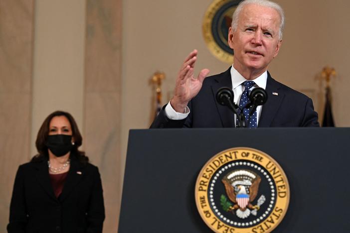 President Biden delivers remarks Tuesday on the guilty verdict against former police officer Derek Chauvin, as Vice President Harris looks on.