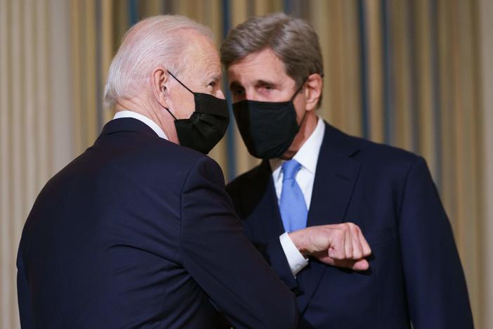 President Biden greets Special Presidential Envoy for Climate John Kerry in January.