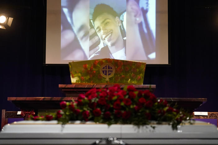 Family images play on a screen before funeral services for Daunte Wright at Shiloh Temple International Ministries in Minneapolis on Thursday.