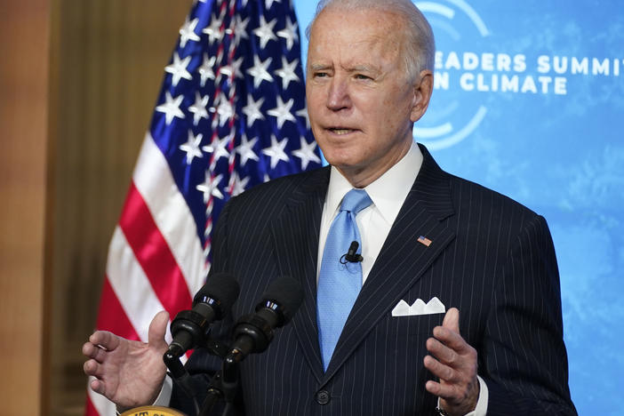 President Biden speaks to world leaders during a virtual climate summit on Friday from the East Room of the White House. The event was part of an effort to restore U.S. leadership on environmental issues after the Trump administration pulled back.