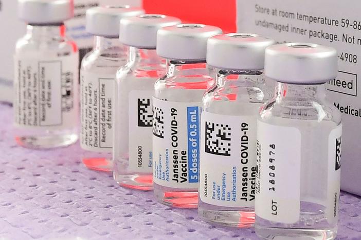 Bottles of the single-dose Johnson & Johnson COVID-19 vaccine await transfer into syringes for administering last month in Los Angeles.