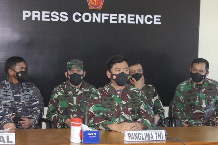 Indonesian military officials changed the status of a missing submarine from "sub miss" to "sub sank" on Saturday. The ship had been missing since Wednesday when it began its dive for a training exercise off the coast of Bali.