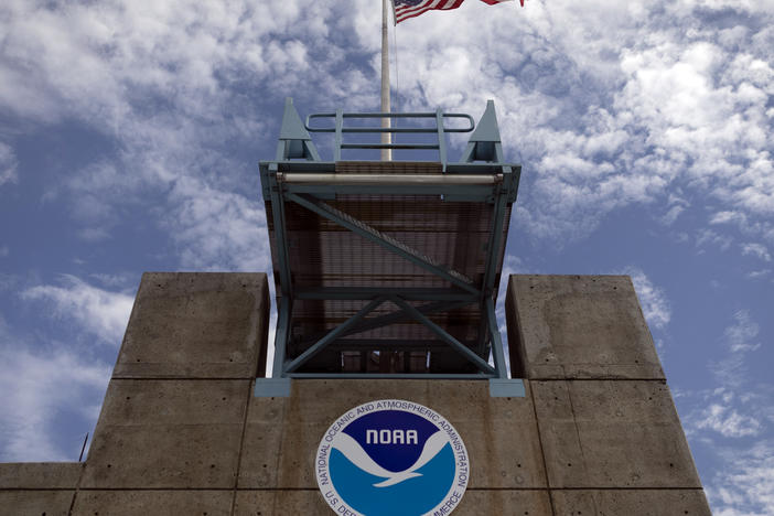 The logo of National Oceanic and Atmospheric Administration is seen at the Nation Hurricane Center in Miami on Aug. 29, 2019. President Biden has nominated Rick Spinrad to head NOAA.