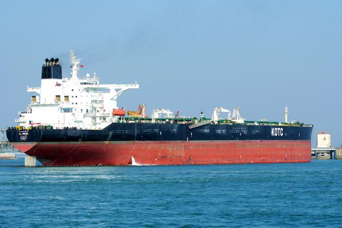 Tankers unload imported crude oil at the Qingdao crude oil terminal in east China's Shandong Province in February. A tanker anchored off the port was reportedly hit Tuesday by another vessel, causing an oil spill in the Yellow Sea.