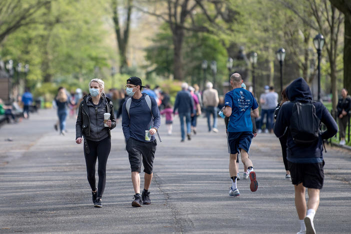 The CDC's latest guidance says people who are fully vaccinated do not need to wear a mask when they're outdoors unless they're in a crowded space.