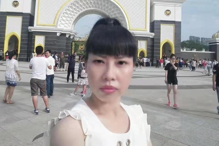 A selfie Feng Daoyou took in Macau. Her older brother Feng Daokun believes she traveled to Hong Kong before flying to the U.S., from where she first contacted him in 2016. Unlike the rest of her family, she did not marry, and seemed to relish venturing far from home. "She could do anything she put her mind to. She was tough. She never gave up. That was just her personality," her brother says.