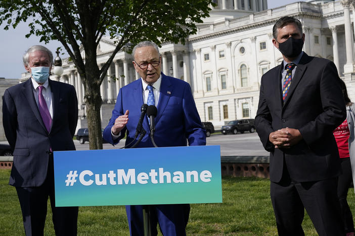 Senate Majority Leader Chuck Schumer, joined by Sens. Ed Markey (left) and Martin Heinrich, discusses legislation Wednesday to reimpose regulations to reduce methane pollution from oil and gas wells.