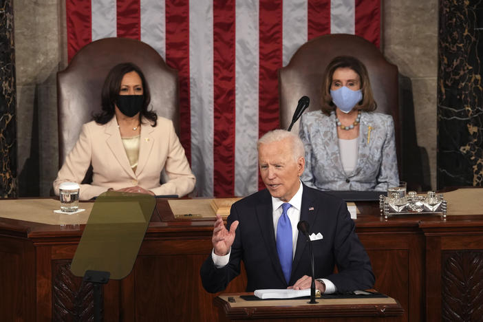 President Biden speaks to a joint session of Congress on Wednesday in the House Chamber at the U.S. Capitol, as Vice President Harris and House Speaker Nancy Pelosi watch.