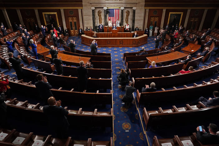 Biden addresses an unusually small crowd of lawmakers and government officials during a joint session of Congress.