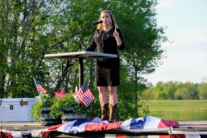 Virginia state Sen. Amanda Chase speaks at a GOP event in King William County. Chase, one of seven Republicans running for governor, has criticized the party-run nominating convention process.