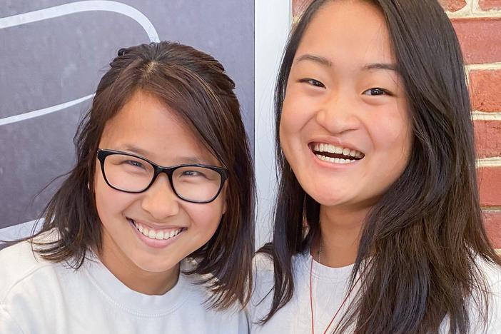 Ally Cole (left) and Ruby Wierzbicki show off the childhood photo that revealed a special connection.