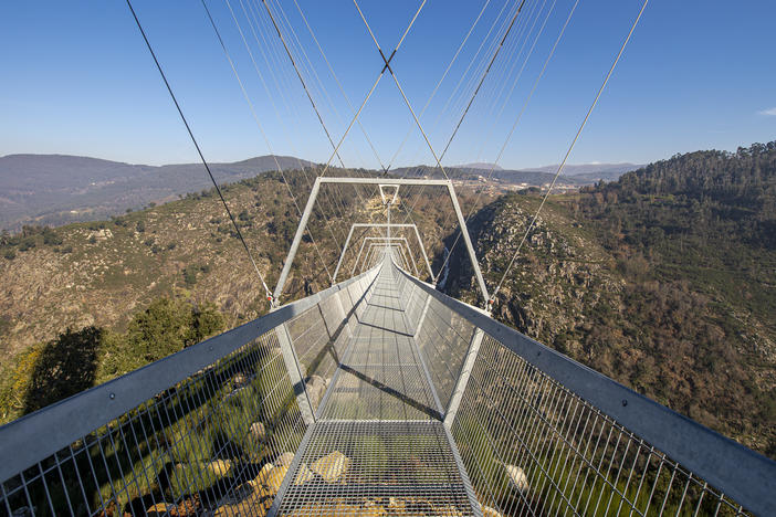 The 516 Arouca, the longest pedestrian suspension bridge in the world, hangs above the Aguieiras Waterfall in the Paiva Gorge in Arouca, Portugal. It is opening to the public next week.