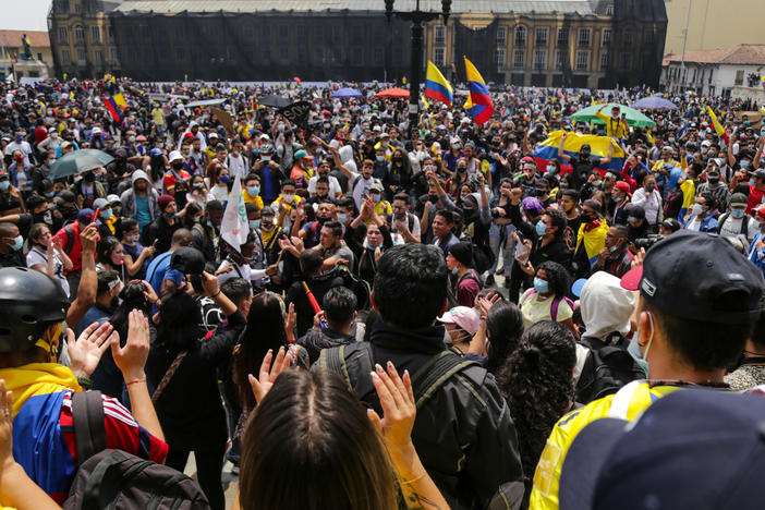 Protesters attend a May Day rally against proposed tax changes in Bogotá on Saturday.