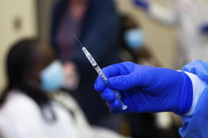 A doctor prepares to administer a vaccine injection at New York-Presbyterian Lawrence Hospital in Bronxville, N.Y., in January. The Food and Drug Administration has approved emergency use authorization of the Pfizer/BioNTech vaccine for patients ages 12 to 15.