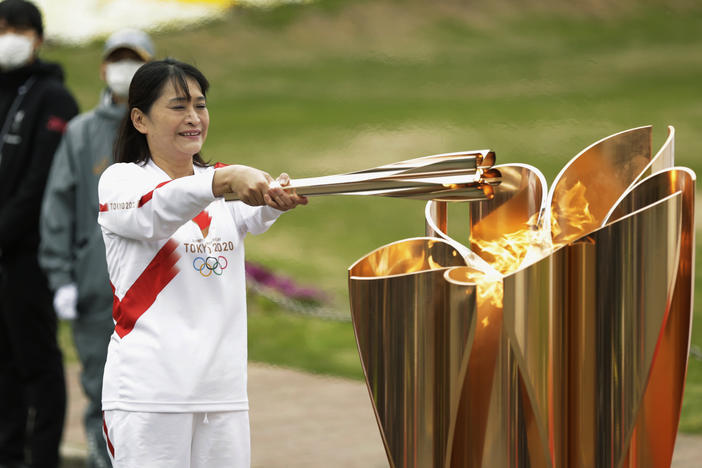 The last Olympic torch relay runner for the Osaka leg concludes the event in Suita, north of Osaka, western Japan, last month.