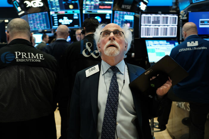 Stock trader Peter Tuchman works on the floor of the New York Stock Exchange on March 9, 2020.