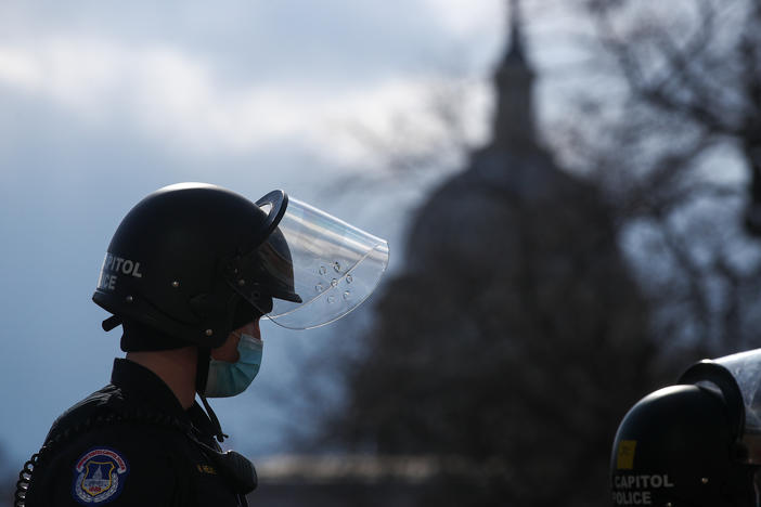 A U.S. Capitol Police officer stands guard outside the Capitol ahead of the inauguration for President Biden on Jan. 20.