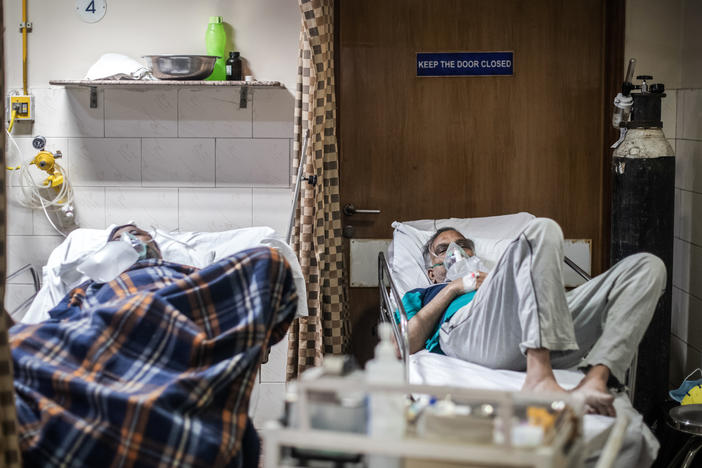 COVID-19 patients in the emergency ward of an unidentified hospital on Monday in New Delhi. Dr. Sumit Ray, a hospital critical care chief in the city, says India's health care system is collapsing.