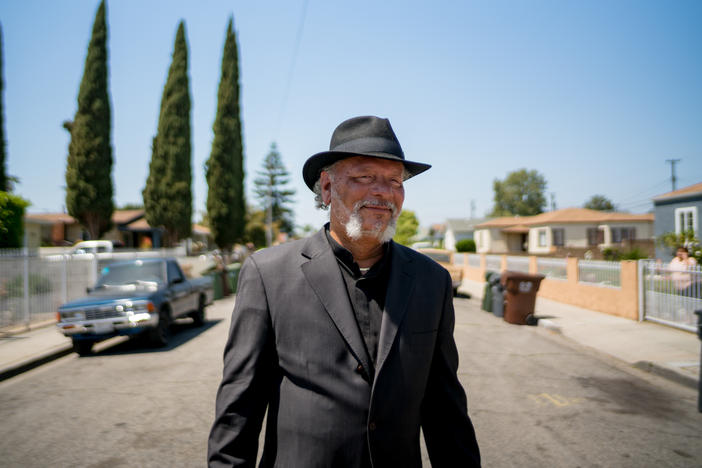 Robert Lee Johnson in his old neighborhood in Compton. Johnson remembers moving in one day in 1961. "I see moving vans, trucks and everything all down the street," he says. Johnson was 5 years old at the time, so he says he thought "it was moving day for everybody." And he noticed that all the other families moving in were were Black, too.