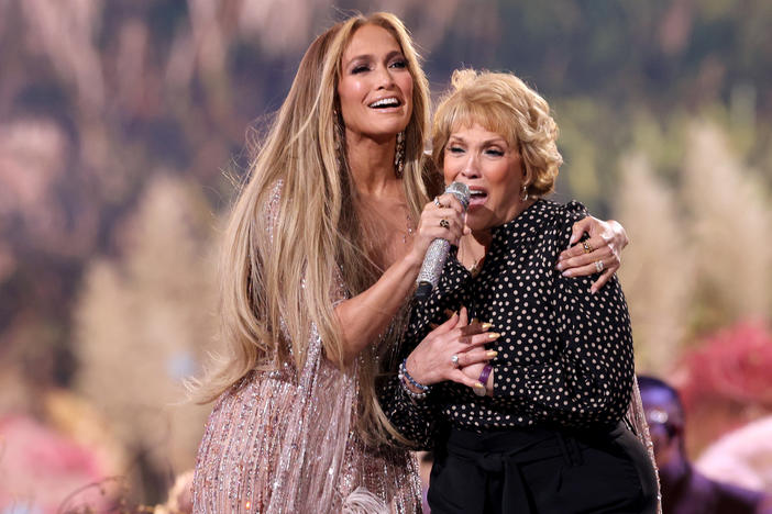 Jennifer Lopez and her mother Guadalupe Rodríguez perform onstage during Global Citizen's "Vax Live: The Concert To Reunite The World," at SoFi Stadium in Inglewood, Calif.